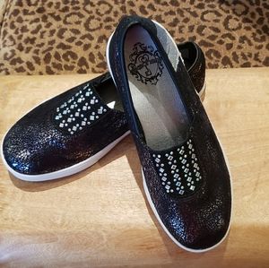 Girls sparkle slip on Skechers sneakers